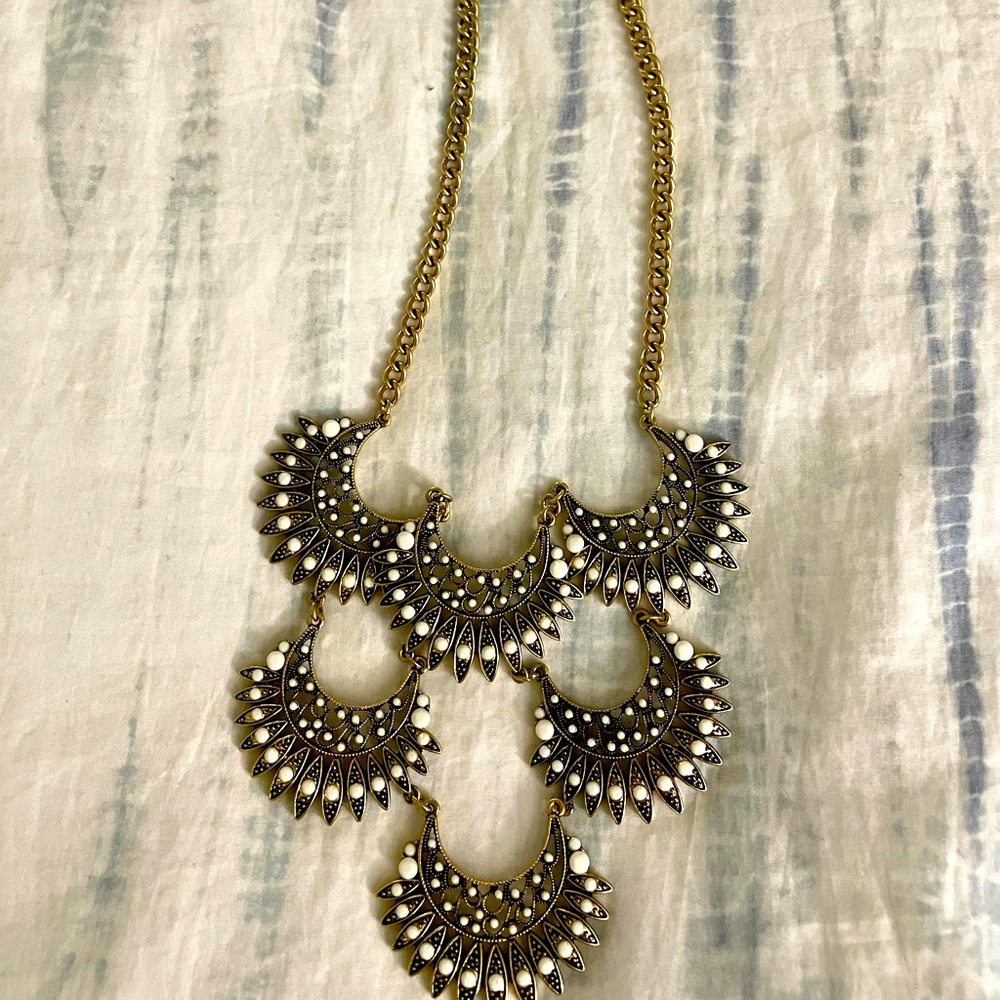 Gold and white feather statement necklace